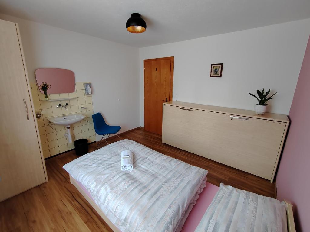 Postel nebo postele na pokoji v ubytování Hotel du Cerf
