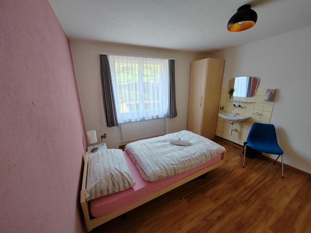 Postel nebo postele na pokoji v ubytování Hotel du Cerf