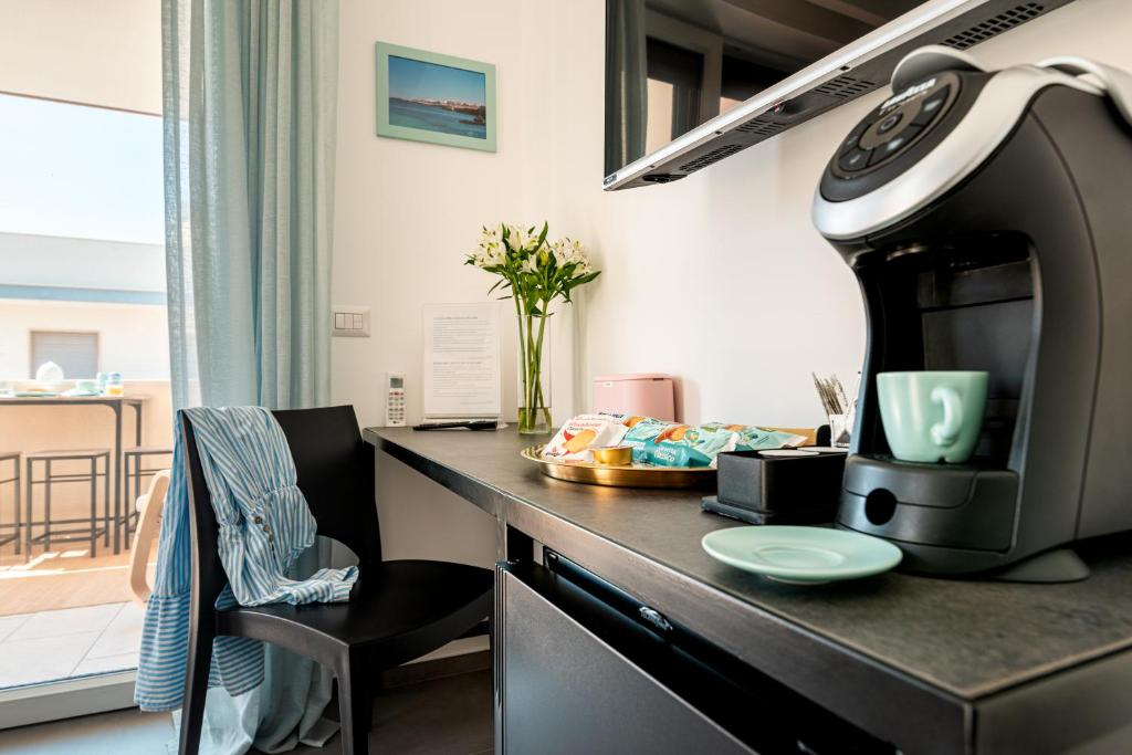 Posezení v ubytování Verdeaqua Rooms