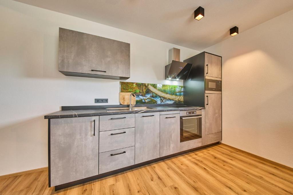 Kuchyň nebo kuchyňský kout v ubytování Apartment Sophie