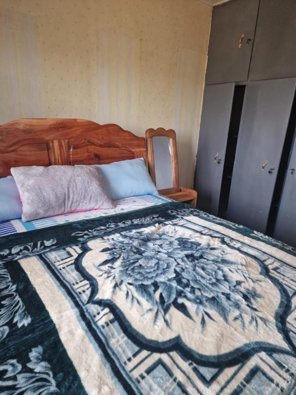 Postel nebo postele na pokoji v ubytování Bel Appartement 2 chambres meublé à Bafoussam