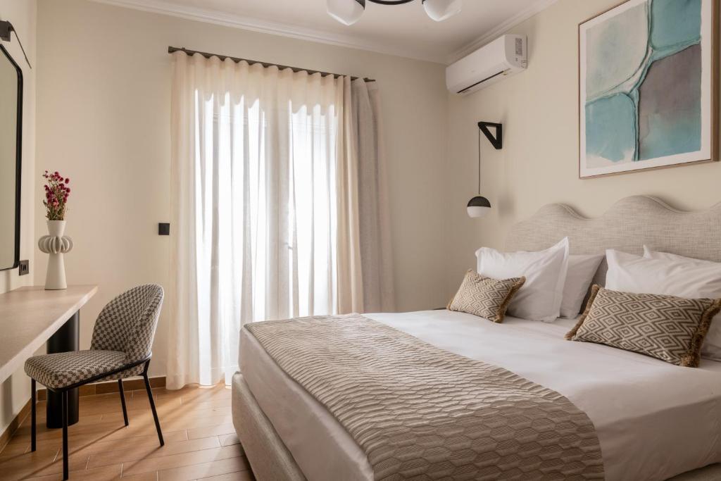 Postel nebo postele na pokoji v ubytování Villa Alexandros