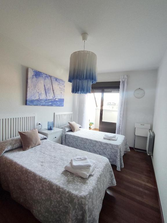 A bed or beds in a room at DÚPLEX SANABRIA
