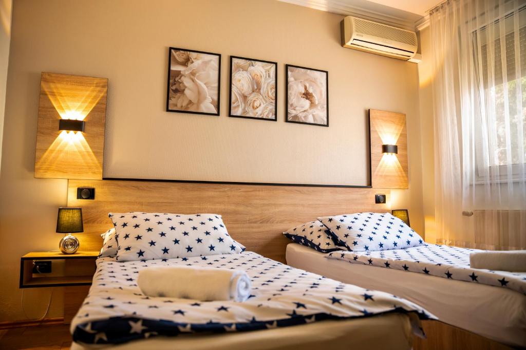 Postel nebo postele na pokoji v ubytování Hotel Bolero