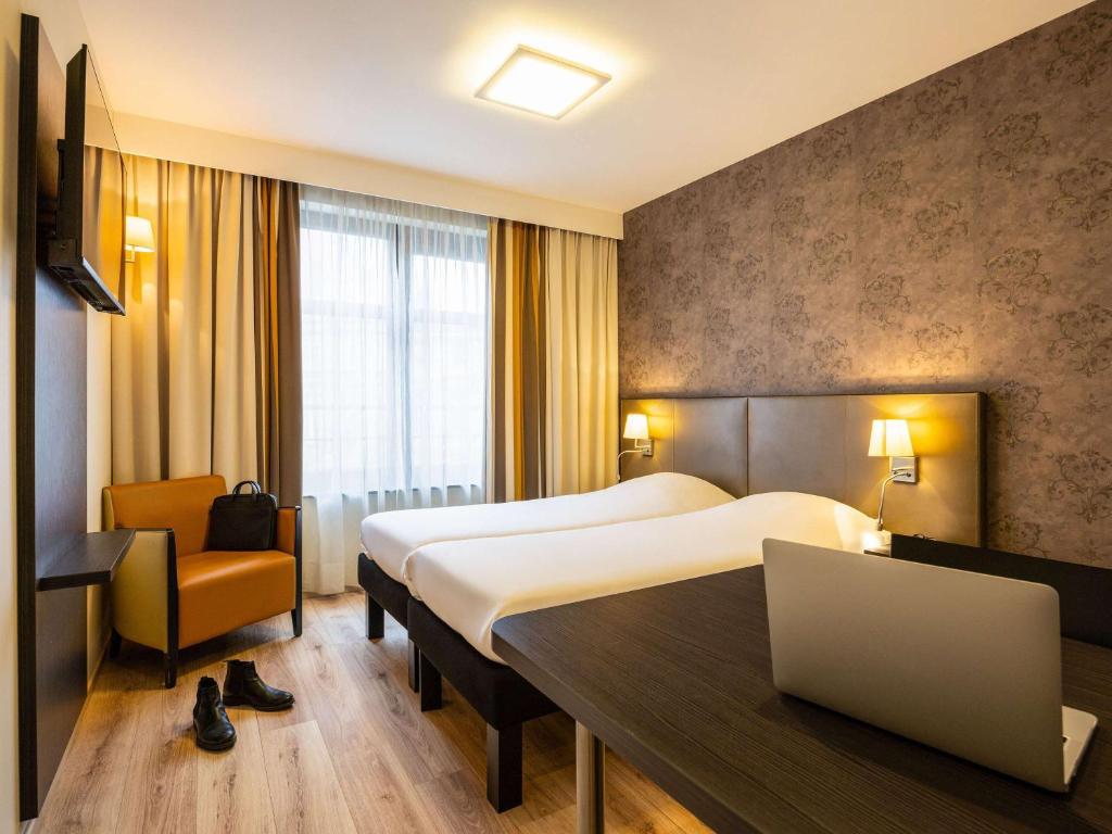 Postel nebo postele na pokoji v ubytování ibis Styles Hotel Brussels Centre Stéphanie