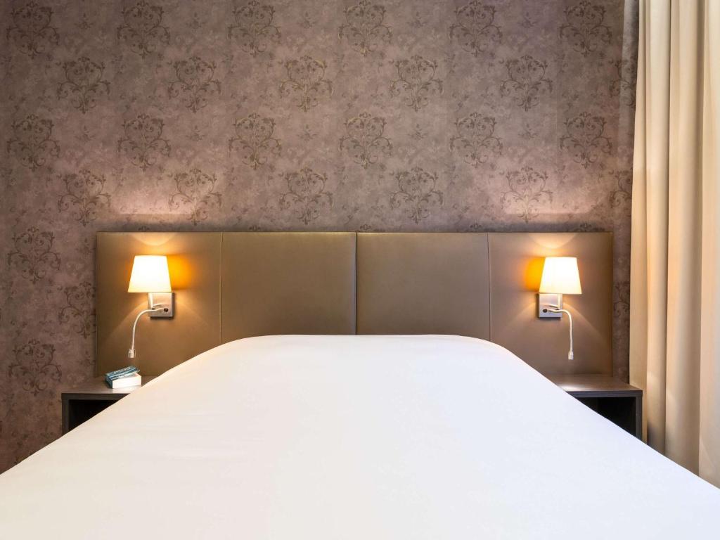 Postel nebo postele na pokoji v ubytování ibis Styles Hotel Brussels Centre Stéphanie