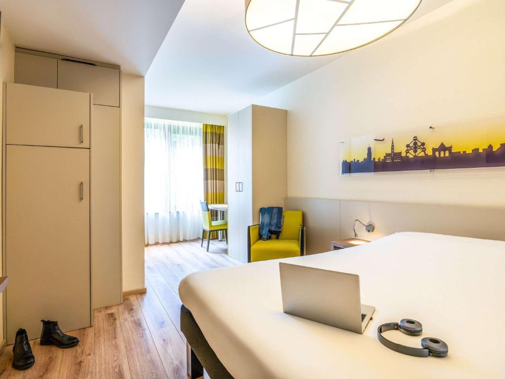 Postel nebo postele na pokoji v ubytování ibis Styles Hotel Brussels Centre Stéphanie