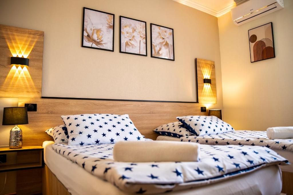 Postel nebo postele na pokoji v ubytování Hotel Bolero