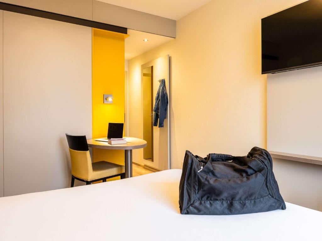 TV a/nebo společenská místnost v ubytování ibis Styles Hotel Brussels Centre Stéphanie
