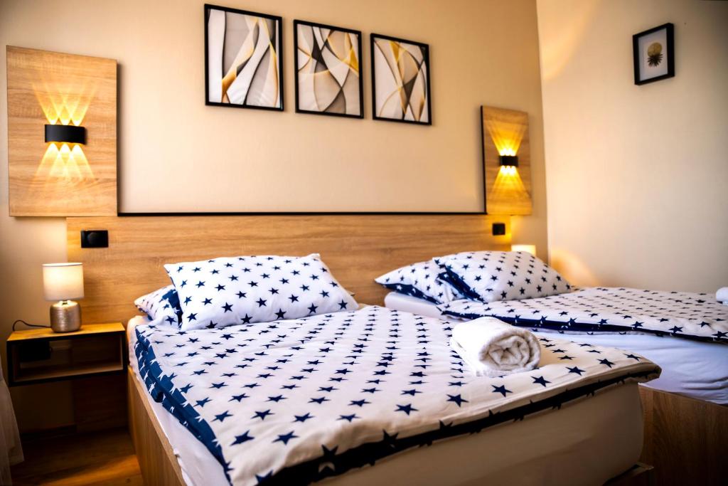 Postel nebo postele na pokoji v ubytování Hotel Bolero