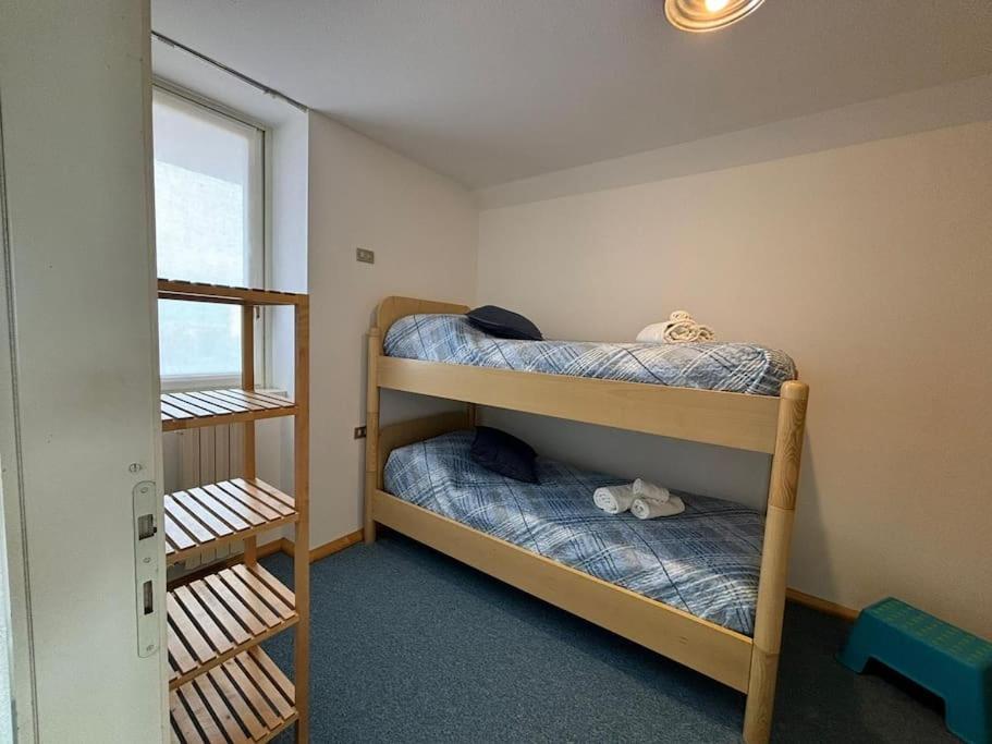 Postel nebo postele na pokoji v ubytování Lake Como Serenity Suite