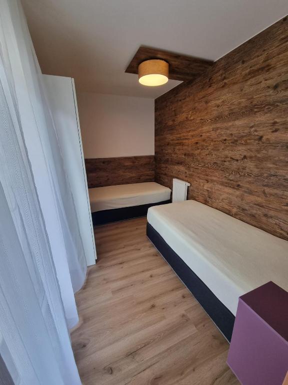 Postel nebo postele na pokoji v ubytování Hotel Gletschermühle