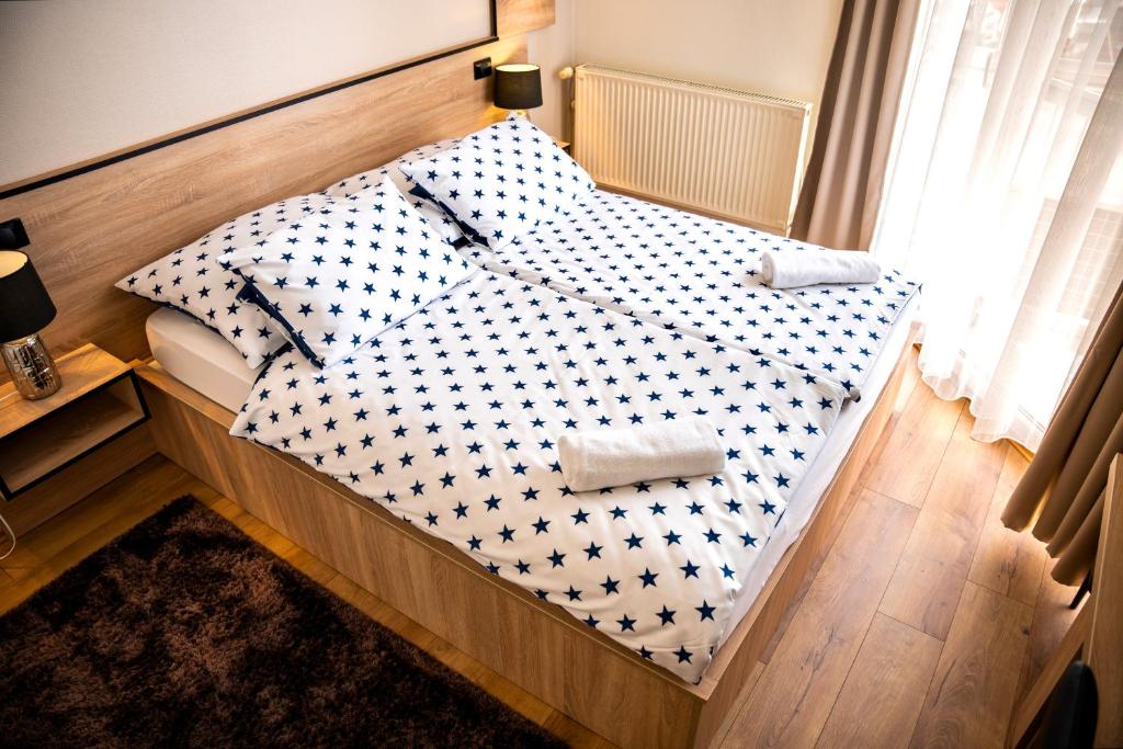 Postel nebo postele na pokoji v ubytování Hotel Bolero
