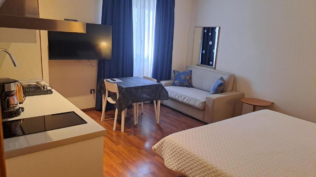 Kuchyň nebo kuchyňský kout v ubytování Hotel Suite Camarena