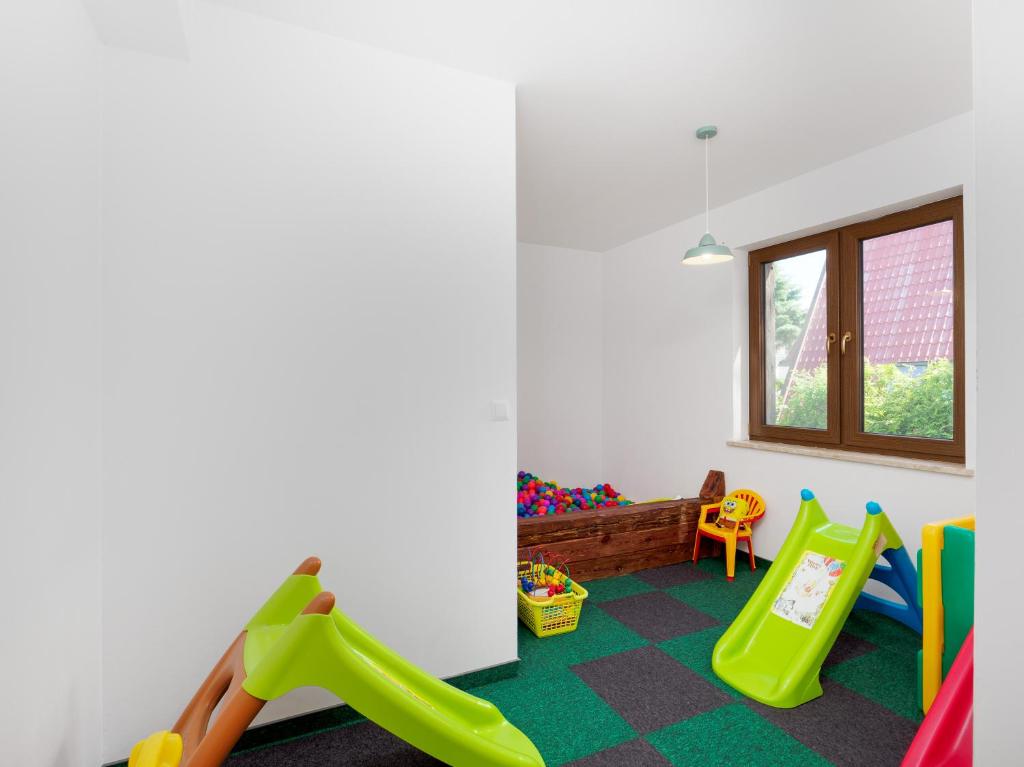 Postel nebo postele na pokoji v ubytování Hotel Aparthotel Baltic Willa