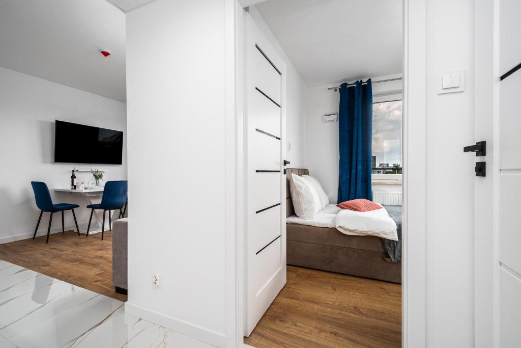 Postel nebo postele na pokoji v ubytování Warsaw Modern Stay