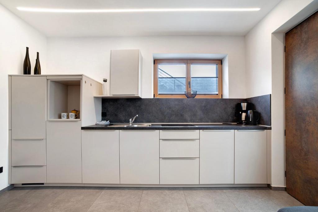 Kuchyň nebo kuchyňský kout v ubytování Haus Nummer 9