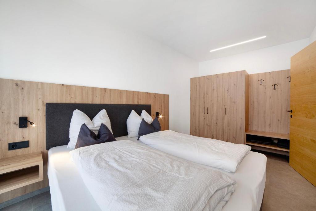 Postel nebo postele na pokoji v ubytování Haus Nummer 9