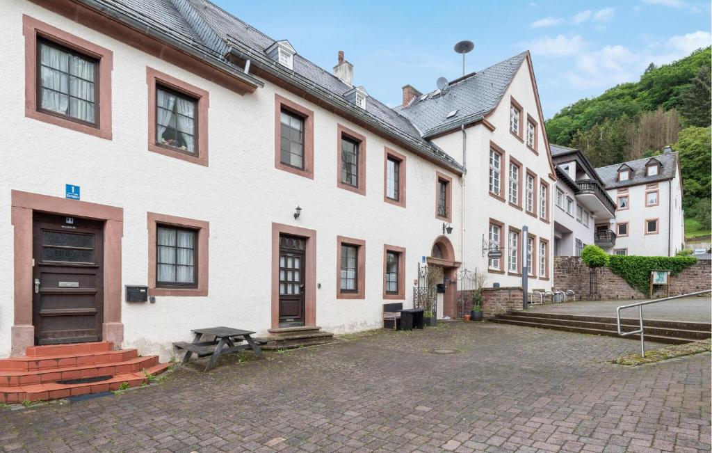 a group of white buildings on a street at 2 Bedroom Awesome Apartment In Malberg in Malberg