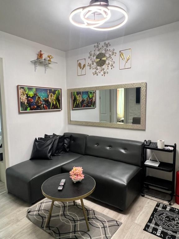 Posezení v ubytování Lan’z cozy 2 bedroom 8 spatial maa
