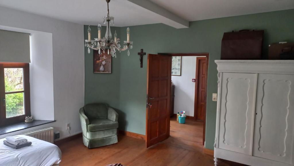 Postel nebo postele na pokoji v ubytování B&B Ferme1883