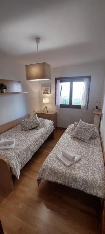 Postel nebo postele na pokoji v ubytování Casa Isabel