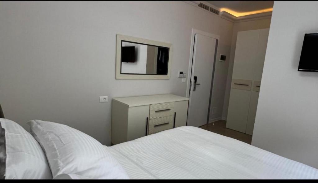 Postel nebo postele na pokoji v ubytování Hotel DEMOLI