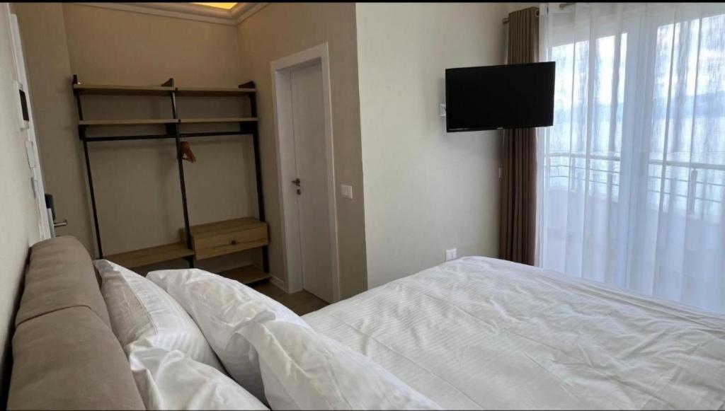 Postel nebo postele na pokoji v ubytování Hotel DEMOLI