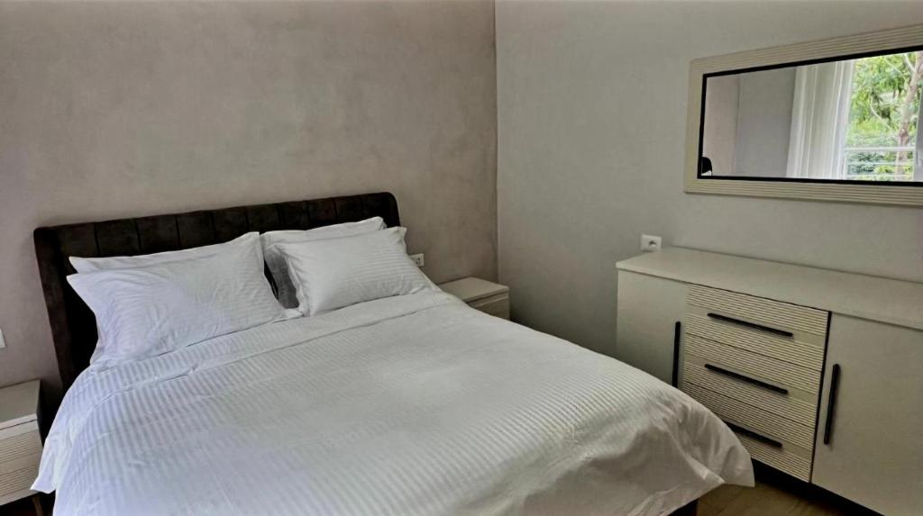 Postel nebo postele na pokoji v ubytování Hotel DEMOLI