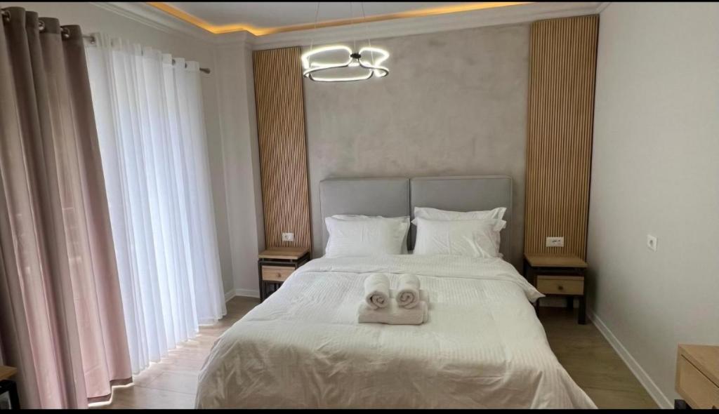 Postel nebo postele na pokoji v ubytování Hotel DEMOLI