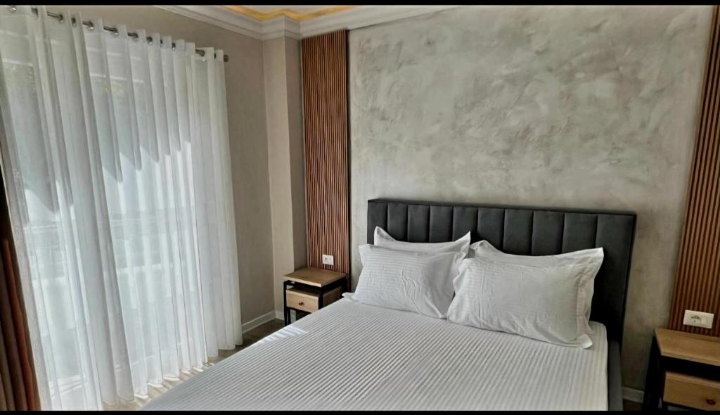 Postel nebo postele na pokoji v ubytování Hotel DEMOLI