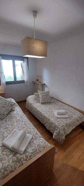 Postel nebo postele na pokoji v ubytování Casa Isabel