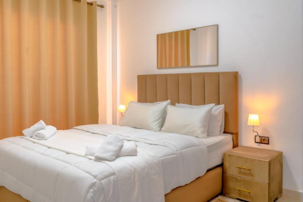 Postel nebo postele na pokoji v ubytování Dakhla Golden Sands