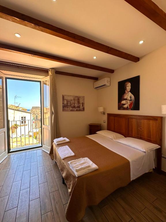 Letto o letti in una camera di LoryLu