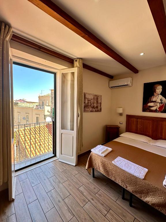 Letto o letti in una camera di LoryLu