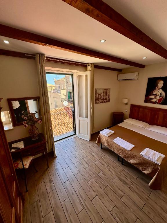 Letto o letti in una camera di LoryLu
