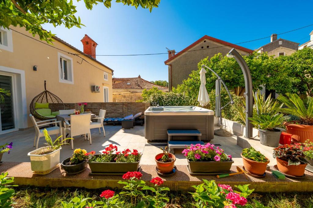 Vonkajšia záhrada v ubytovaní SkyGarden House