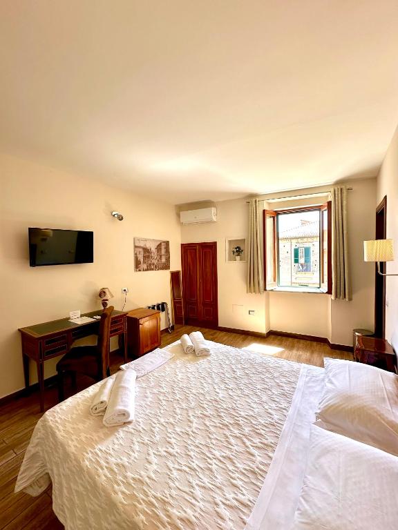 Letto o letti in una camera di LoryLu
