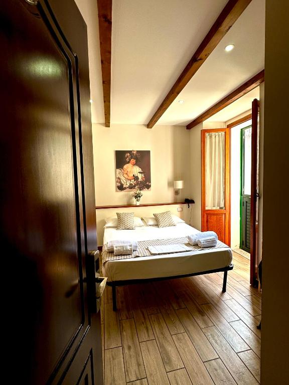 Letto o letti in una camera di LoryLu
