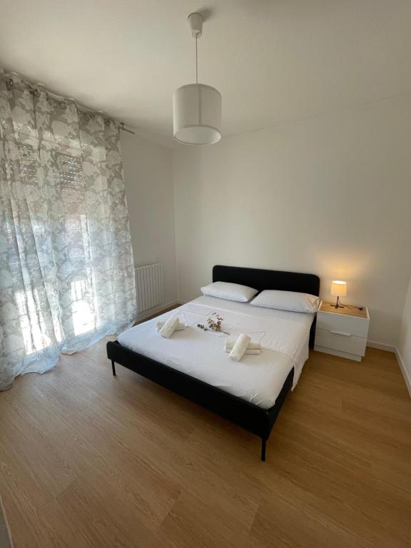 Postel nebo postele na pokoji v ubytování Miramonti house