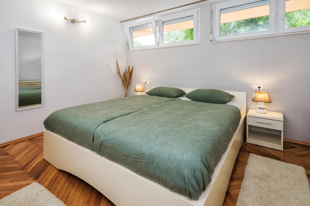 Posteľ alebo postele v izbe v ubytovaní Green Oasis
