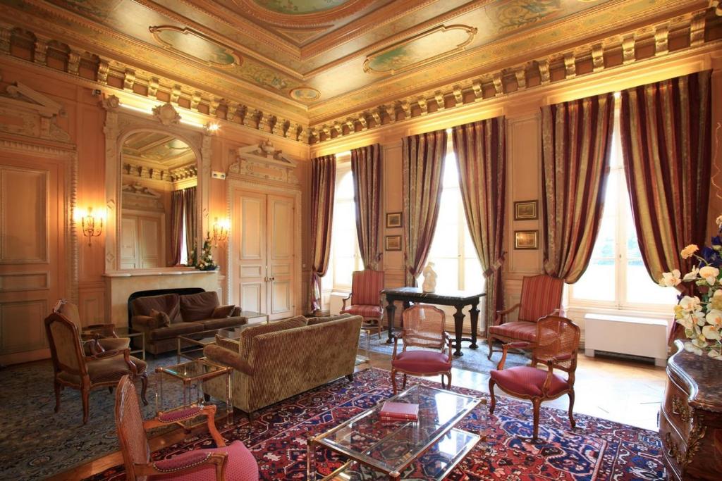 Posezení v ubytování Château De La Motte Fenelon