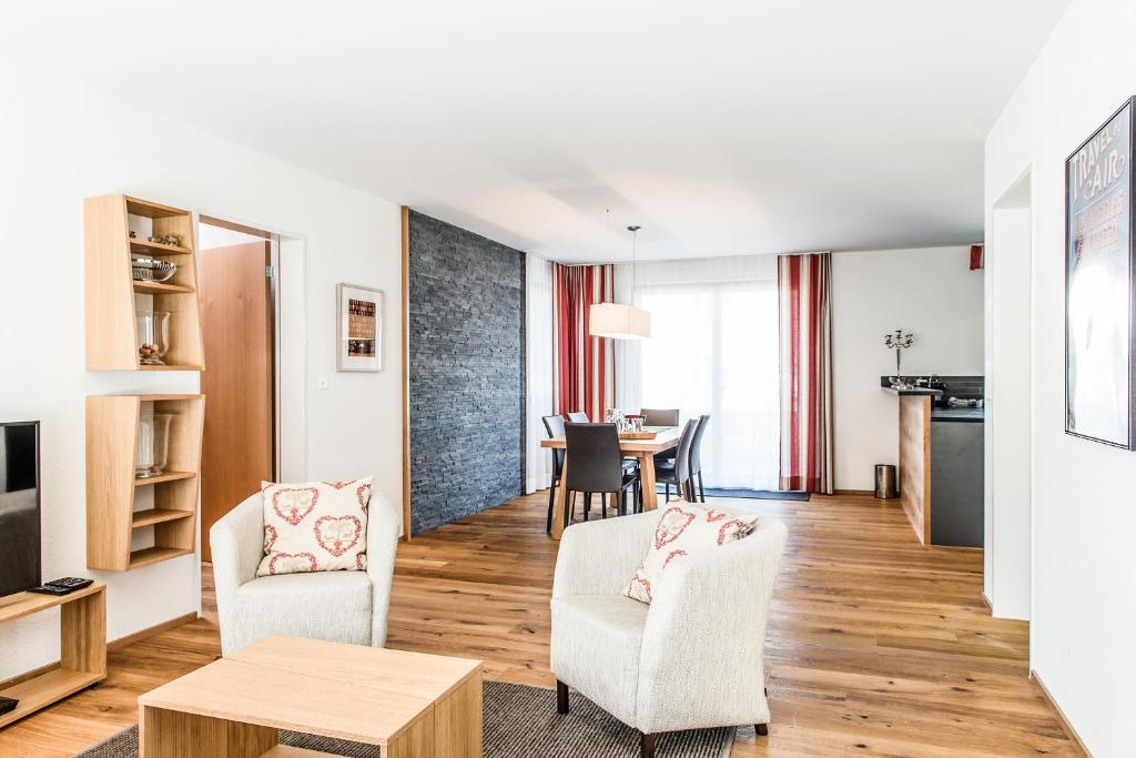 TV a/nebo společenská místnost v ubytování Titlis Resort