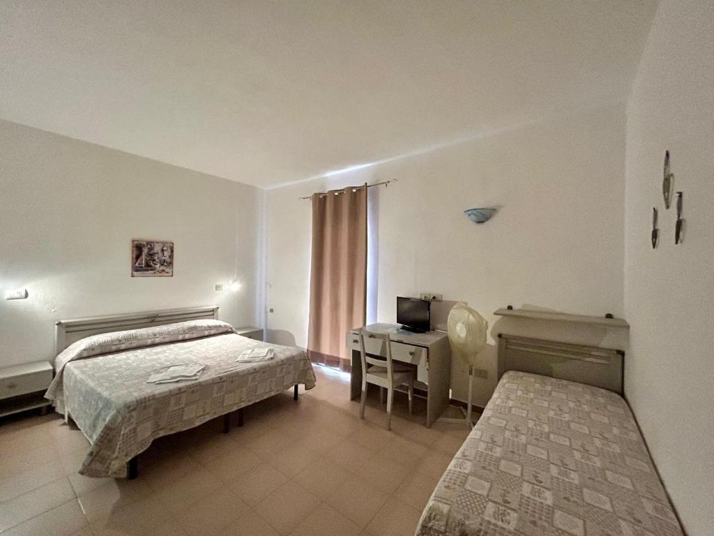 Postel nebo postele na pokoji v ubytování Bed & Breakfast Alex