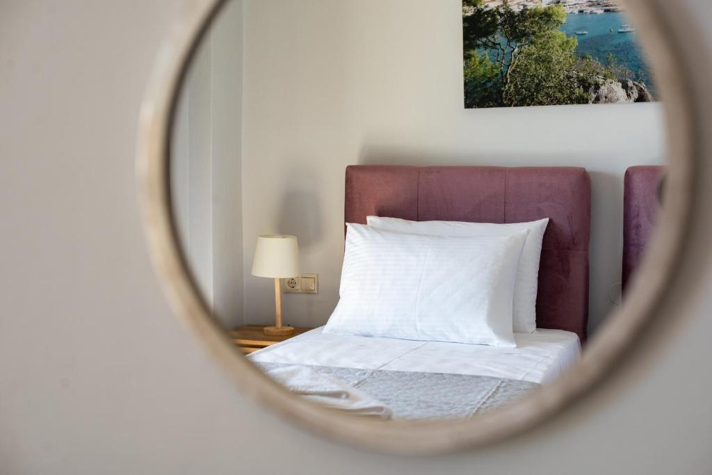 Postel nebo postele na pokoji v ubytování Lengo D Home II
