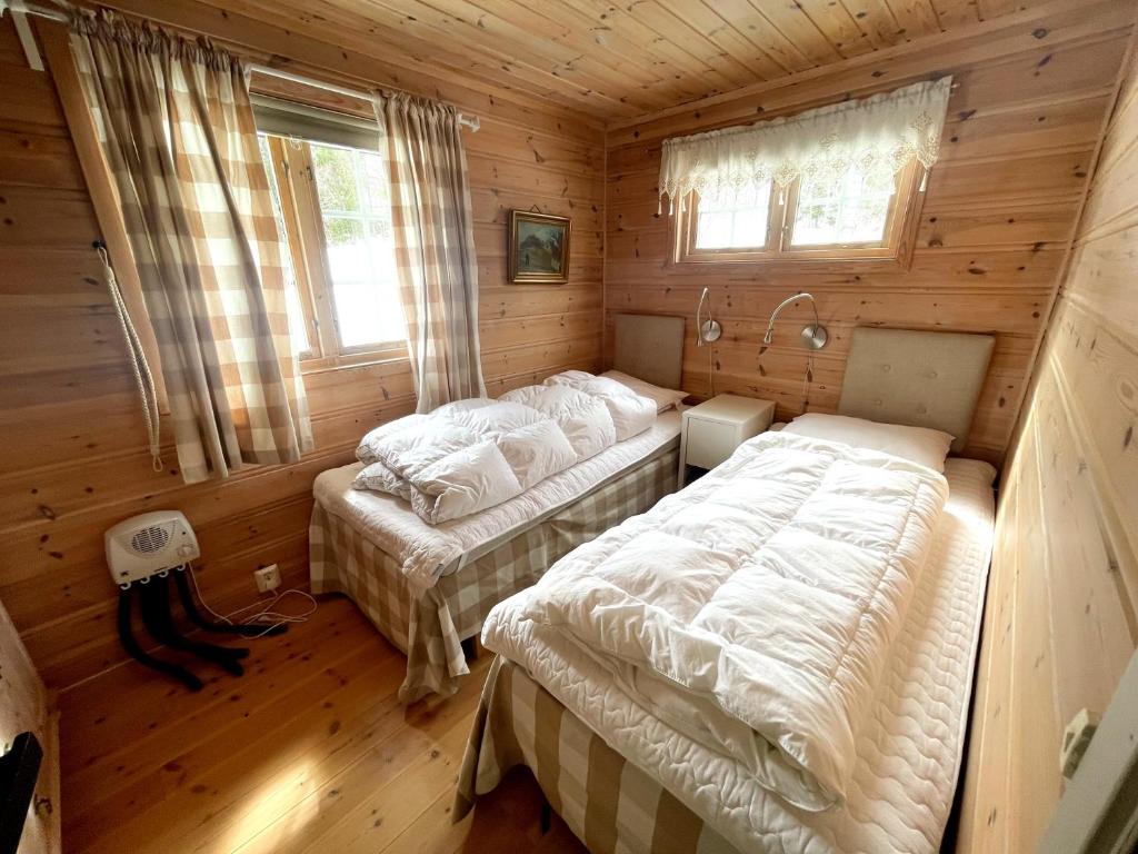 Postel nebo postele na pokoji v ubytování Middagslia - cabin at Skrim with amazing view