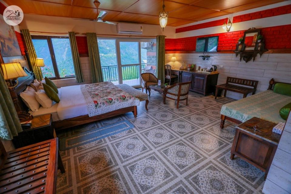 Postel nebo postele na pokoji v ubytování Hotel Udechee Huts, McLeod Ganj