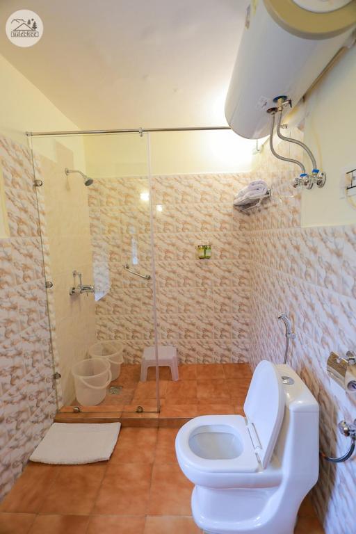 Koupelna v ubytování Hotel Udechee Huts, McLeod Ganj