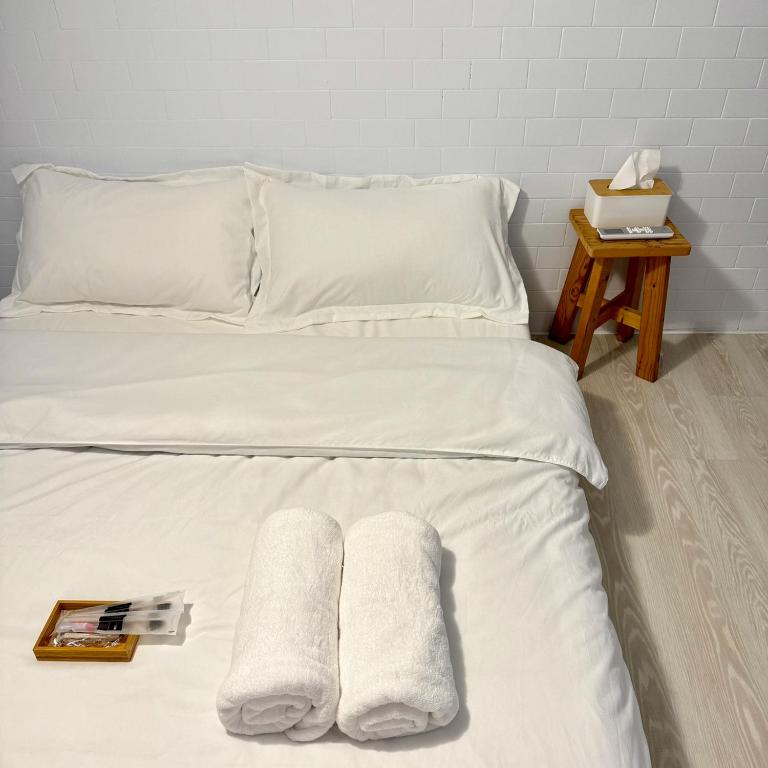 Postel nebo postele na pokoji v ubytování Simple Dog Bungalow