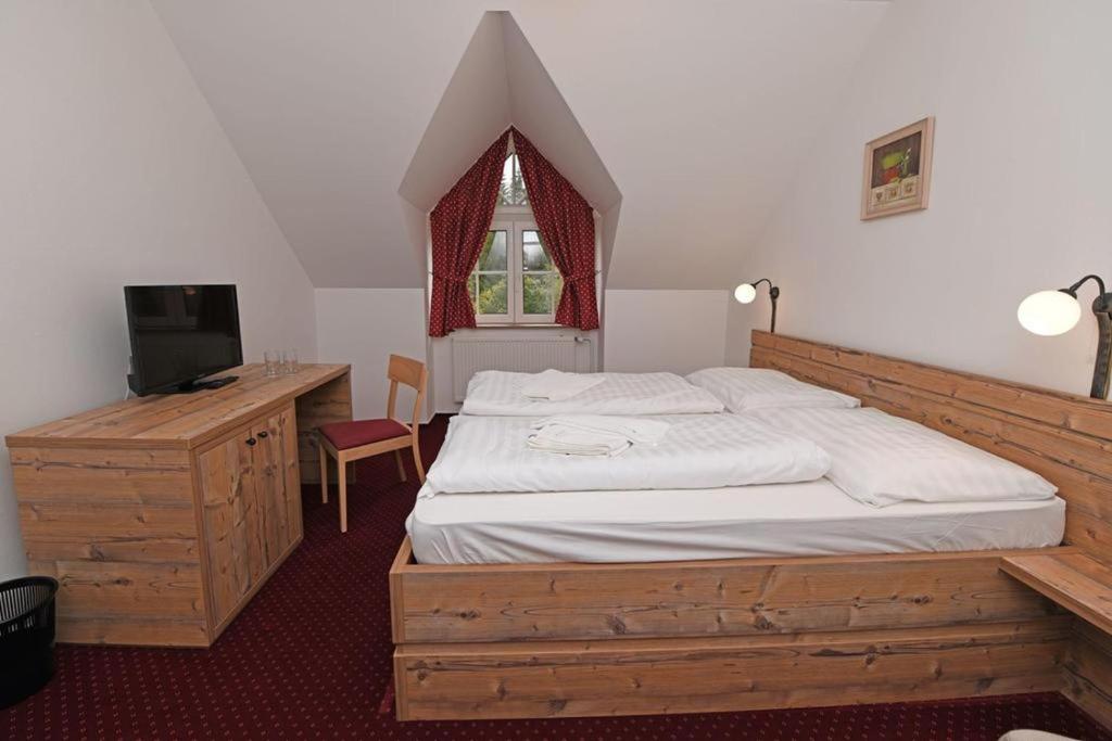 Postel nebo postele na pokoji v ubytování Hotel Konšel